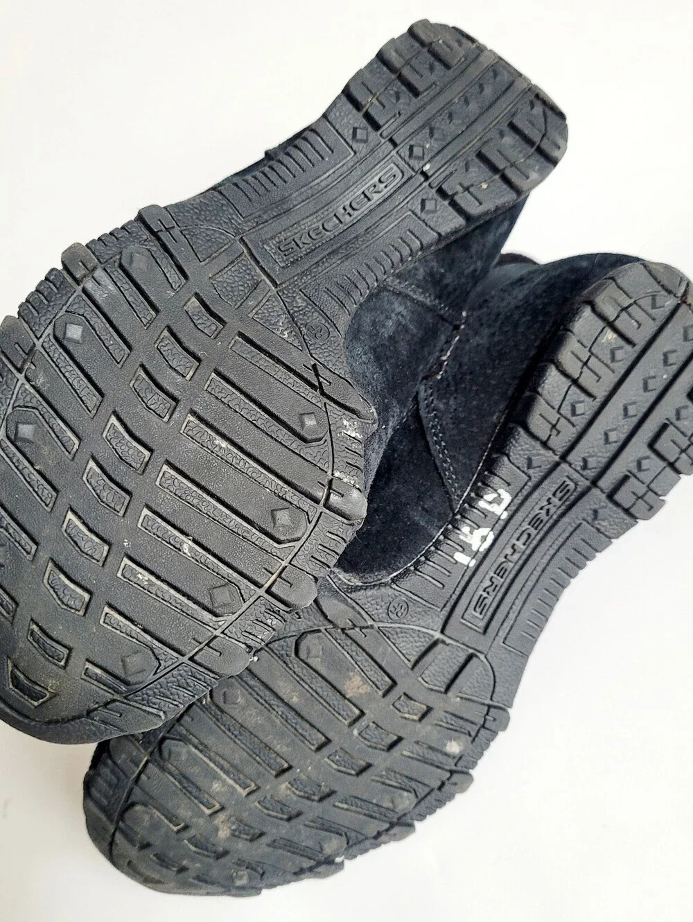 Skechers black suede